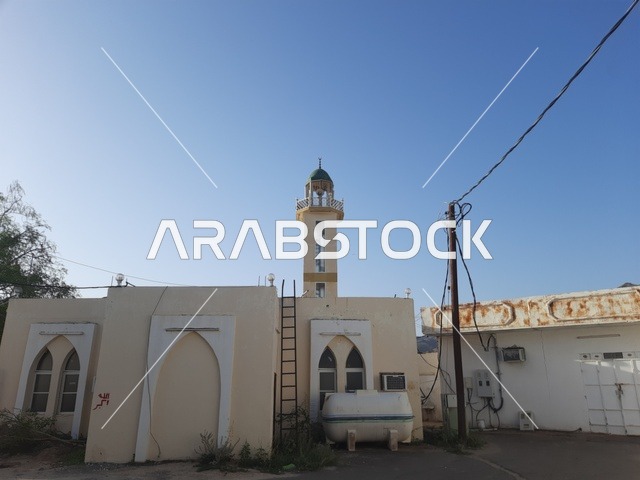 An Islamic mosque in the Al-Baha region, the architectural engineering art of building mosques in the Islamic style, the sacred Islamic religious landmarks in the Kingdom of Saudi Arabia, the concept of worship and drawing closer to God Almighty.