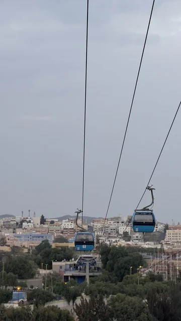 The most important natural tourist places and landmarks in the Kingdom of Saudi Arabia, enjoying fun youth recreational activities in the areas of peaks and mountain heights, the mobile cart in nature, a cable car in the Asir Mountains, tourism and entertainment and spending enjoyable time.