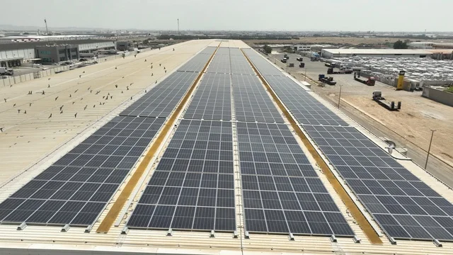 Development of infrastructure for electricity generation, renewable solar energy stations, the concept of producing environmentally friendly alternative energy in the Kingdom of Saudi Arabia, aerial drone photography of photovoltaic panels.