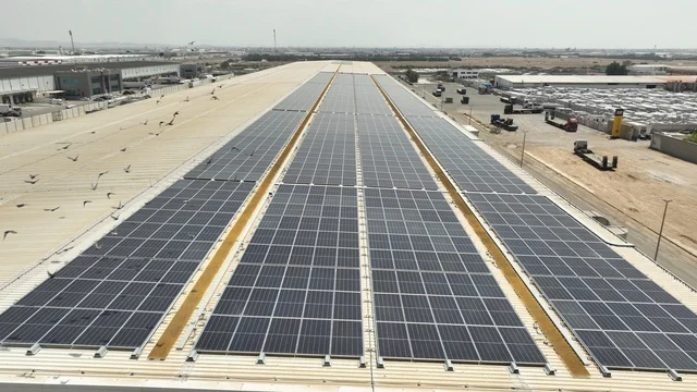 Development of infrastructure for electricity generation, renewable solar energy stations, the concept of producing environmentally friendly alternative energy in the Kingdom of Saudi Arabia, aerial drone photography of photovoltaic panels.