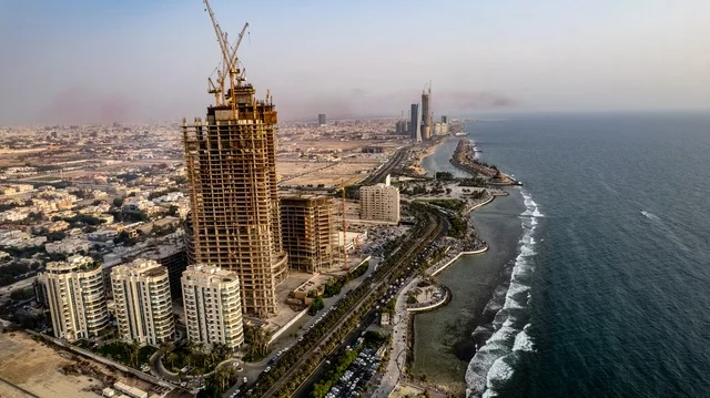 The towers and skyscrapers in the coastal city, the architectural engineering art of the Corniche Tower building in Jeddah, the waterfront in the Kingdom of Saudi Arabia, enjoying the aquatic natural scenery, the skyline and famous commercial landmarks during the day. The towers and skyscrapers in the coastal city, the architectural engineering art of the Corniche Tower building in Jeddah, the waterfront in the Kingdom of Saudi Arabia, enjoying the aquatic natural scenery, the skyline and famous commercial landmarks during the day.