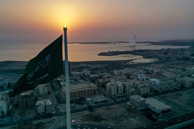 Streets and roads of the Al-Balad neighborhood in the city of Jeddah at sunset, the buildings and commercial towers.