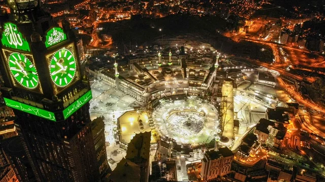 Aerial drone photography of the Clock Tower in Mecca, Saudi Arabia, skyscrapers and high-rise buildings, architectural engineering art, famous landmarks of Saudi Arabia.
