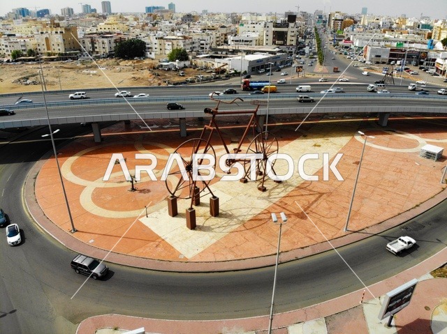 تصوير درون جوي لدوار الدراجة ، معالم الرياض المشهورة ،طريق الملك فهد