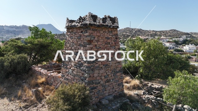 Attracting tourists from around the world, ancient architectural engineering art, a historical heritage fortress made of stone, architectural engineering art of palaces and ancient buildings, famous tourist attractions, historical and tourist landmarks in the Asir, Al-Baha, Abha, and Taif regions in the Kingdom of Saudi Arabia.