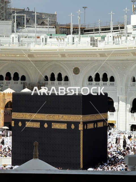 Muslim pilgrims in Mecca, the Holy Mosque in Mecca, Saudi Arabia, performing the rituals of Hajj and Umrah, circumambulating at sunset, sacred Islamic places, pilgrims of the House of Allah are circumambulating around the Holy Kaaba in the Holy Mosque.