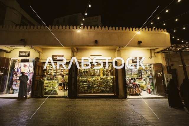 A traditional market in the city of Jeddah, historical landmarks in the Al-Balad district, popular heritage tourist sites in the Kingdom of Saudi Arabia, the old rawashin in the historical city of Jeddah, ancient Arab and Islamic architectural design, attractions and tourist hotspots.