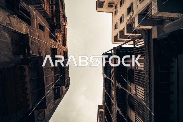 The old rawashin in the historical city of Jeddah, an ancient Arab and Islamic architectural design, the heritage houses in the historical district of Jeddah, popular heritage tourist spots in the Kingdom of Saudi Arabia, the historical landmarks in the Al-Balad neighborhood.