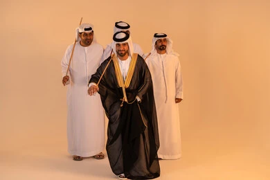 Embodiment of national identity and belonging, preserving popular customs and traditions during national occasions, expressions of joy and celebration of the authentic Emirati heritage, a portrait of a group of Emirati Gulf Arab men wearing the kandura and ghutrah performing the traditional Ayala dance with wooden sticks, a festive atmosphere filled with pride and honor. Embodiment of national identity and belonging, preserving popular customs and traditions during national occasions, expressions of joy and celebration of the authentic Emirati heritage, a portrait of a group of Emirati Gulf Arab men wearing the kandura and ghutrah performing the traditional Ayala dance with wooden sticks, a festive atmosphere filled with pride and honor.
