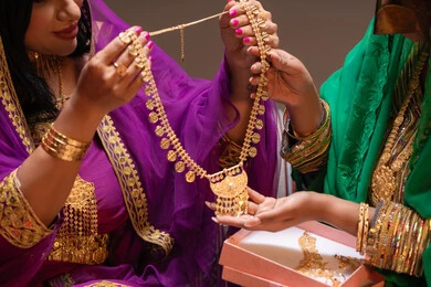 Wedding rings and engagement, customs and traditions in proposing to a girl, happy celebrations and occasions, beauty products and cosmetics, a close-up image of two Emirati Gulf Arab women showcasing the preparations and arrangements for the wedding, gestures of happiness and joy, celebrating the night of a lifetime.