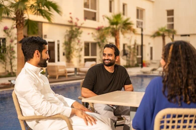 Spending enjoyable family time outdoors, visiting relatives and family, recreational resorts and chalets in the Kingdom, a Saudi Gulf Arab family enjoying time in one of the tourist chalets, family entertainment activities, a fun summer vacation.