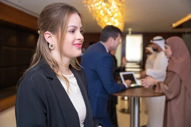 Supervision and auditing of work, concluding successful agreements and business deals, discussion and understanding among employees, exchanging experiences and information to achieve goals, strategic planning and organization, a foreign businesswoman discussing work methods and professional development in companies in the United Arab Emirates.