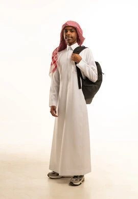 Standing with a straight back and posture, back-to-school season, a portrait of a Saudi Arabian Gulf Arab student wearing traditional attire and a shemagh, holding a school backpack, looking at the camera with gestures of joy and happiness, full-body shot, white background. Standing with a straight back and posture, back-to-school season, a portrait of a Saudi Arabian Gulf Arab student wearing traditional attire and a shemagh, holding a school backpack, looking at the camera with gestures of joy and happiness, full-body shot, white background.