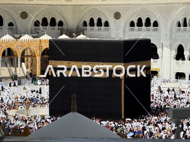 Visiting the Sacred House of God in Mecca, places and holy Islamic religious landmarks in the Kingdom of Saudi Arabia, a destination for Muslims from around the world, pilgrims and Umrah performers circumambulate the Holy Kaaba in the Sacred Mosque, performing the rituals of Hajj and Umrah.