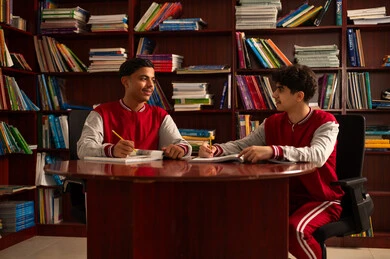 The educational system in Saudi Arabia, preparing for the new school year, completing school assignments, reviewing daily lessons, returning to school, studying for school exams, two Arab Gulf students from Saudi Arabia are solving school lessons.