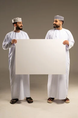 Using an educational visual aid, ensuring clear understanding using the blackboard, a portrait of two Omani Gulf Arab men wearing dishdashas and kumas looking at each other, gray background