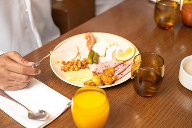 Recipes with distinctive flavors, delicious dishes and appetizers, a plate of traditional popular cuisine, a breakfast meal with diverse and nutritious dishes, serving different foods in UAE restaurants, the art of food presentation in Eastern kitchens.