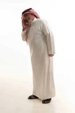 Screaming at someone, a portrait of an elderly Arab Gulf Saudi man wearing traditional attire, gesturing with his hand in a loud voice, full body length, white background.