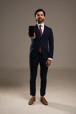 A display of a blank black screen, integrating technology into practical life, using modern and advanced technology, managing and organizing work affairs online, a portrait of an Arab Gulf Saudi businessman wearing a formal suit holding a tablet in his hand, full-body, white background.