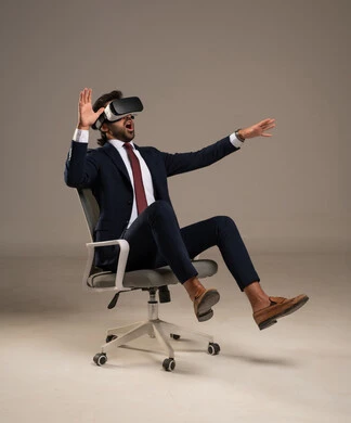 مفهوم التطور التقني والتكنولوجي، الاندماج و التفاعل مع الواقع الافتراضي, محاكاة العالم الخيالي, محاولة النقر على شيء ما, بورتريه لرجل عربي خليجي سعودي يرتدي البدلة الرسمية يجلس على كرسي مريح يضع نظارات ثلاثية الأبعاد يقومبتحريك يديه للاعلى، خلفية بيضاء مفهوم التطور التقني والتكنولوجي، الاندماج و التفاعل مع الواقع الافتراضي, محاكاة العالم الخيالي, محاولة النقر على شيء ما, بورتريه لرجل عربي خليجي سعودي يرتدي البدلة الرسمية يجلس على كرسي مريح يضع نظارات ثلاثية الأبعاد يقومبتحريك يديه للاعلى، خلفية بيضاء