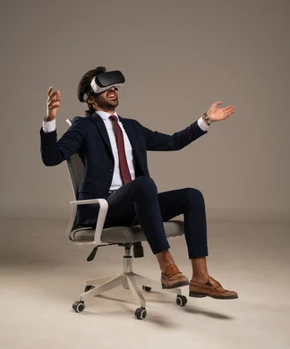 Simulation of the imaginary world, integration and interaction with virtual reality, using a modern technical device, trying to click on something, a portrait of a Saudi Arabian Gulf man wearing a formal suit sitting on a comfortable chair wearing 3D glasses raising his index finger upwards, white background.