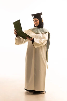 Academic education in Saudi Arabia, expressions of pride and happiness, celebrating success and the end of the academic year, a portrait of a smiling Arab Saudi Gulf student wearing an abaya and graduation cap holding her diploma in her hands, the concept of excellence and graduating from university, full-body image, white background.