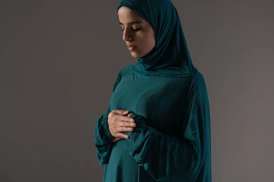 The refinement of the soul and submission to Allah Almighty, obedience and worship, and drawing closer to Allah through the performance of acts of worship, a portrait of an Arab Gulf Emirati woman wearing a hijab and abaya standing on a prayer rug performing the obligatory prayers, a Saudi woman supplicating and being humble during prayer, Islamic themes and worship, white background.