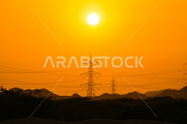 صورة جمالية خلابة لغروب الشمس البرتقالي , غروب الشمس الإبداعي في جدة , جمال الطبيعة في السعودية وقت الغروب، صورة ظلية للطبيعة الخلابة بالسعودية ، محطة الكهرباء في جدة وقت الغروب ، طاقة كهربائية