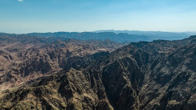 The beauty of tourist areas in Saudi Arabia, a drone image from above of Wadi Tayeb Asm in the north of Muqna west of Al-Bida in Saudi Arabia, the Red Sea coast in Tabuk in the north of the Kingdom of Saudi Arabia, the beauty of tourist areas in Saudi Arabia, the Gulf of Aqaba, Neom, the nature in the regions of the Kingdom of Saudi Arabia.