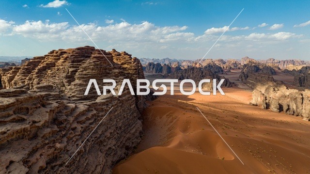 The mountainous environment and highlands in the Kingdom of Saudi Arabia, a picture of Mount Al-Safina in the Neom area of Jeddah, northwest of the Kingdom of Saudi Arabia, stunning landscapes of golden sands, mountains with attractive rock formations in Tabuk, and cultural and tourist landmarks in the Kingdom of Saudi Arabia.
