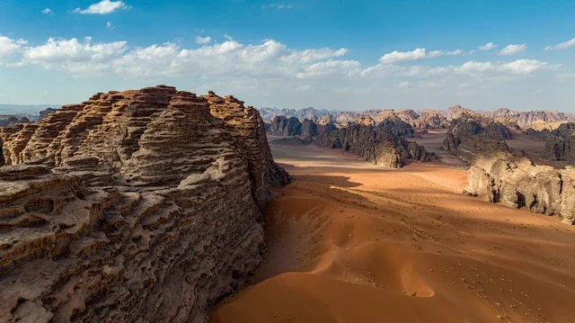 The mountainous environment and highlands in the Kingdom of Saudi Arabia, a picture of Mount Al-Safina in the Neom area of Jeddah, northwest of the Kingdom of Saudi Arabia, stunning landscapes of golden sands, mountains with attractive rock formations in Tabuk, and cultural and tourist landmarks in the Kingdom of Saudi Arabia.