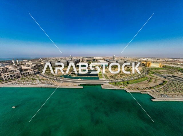 A guide for the navigation of ships and sailors, King Abdullah University of Science and Technology in Thuwal, the architectural engineering art of King Abdullah University of Science and Technology, aerial photography of KAUST in the city of Thuwal in Jeddah, Saudi Arabia, aerial image, the lighthouse of King Abdullah University.