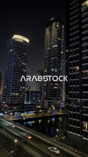 المباني والمنشآت التجارية في الامارات العربية المتحدة, النمو والتطور العمراني لأبراج الإمارات المضيئة ليلاً،  الفن الهندسي المعماري على الطراز الحديث للأبراج وناطحات السحاب، معالم وأماكن سياحية مشهورة في مدينة دبي، جذب واستقطاب السياح من أنحاء العالم