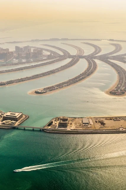 Tourist resorts in the United Arab Emirates, recreational summer activities, aerial photo of Palm Jumeirah in Dubai, attracting and drawing tourists from around the world.