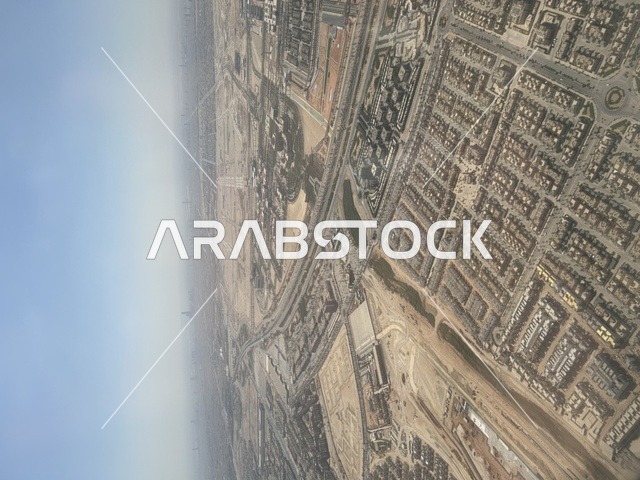 Famous residential areas, an aerial image of the city of Riyadh in the Kingdom of Saudi Arabia, population congestion in the capital, houses and service roads.