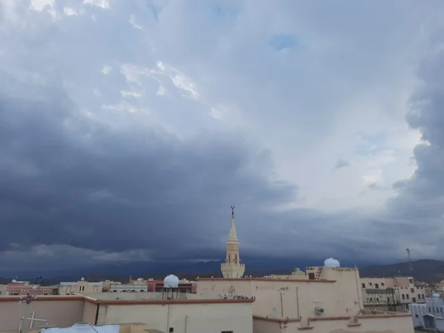 Sacred religious landmarks in mountainous areas, parks and recreational gardens in the Kingdom, architectural engineering art for building mosques in Saudi Arabia, terrain in mountain peaks and highlands, tourist attractions in the Al-Hijrah area in the city of Al-Baha, enjoying the calm atmosphere at sunset.