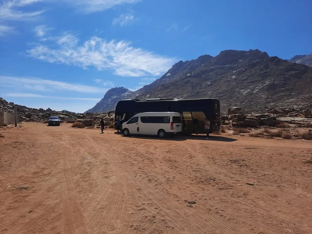 A picture of the rock formations and structures in the middle of the Saudi desert, the ancient historical archaeological sites, the herbs and plants in the desert areas, safari trips and enjoyable recreational activities, tourist attractions in the desert areas of the Kingdom.