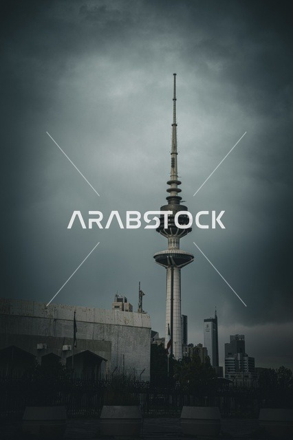 The architectural engineering art of the towers of Kuwait City, skyscrapers and structures on the coast of the Arabian Gulf in the Ras Ajouzah area, the development and urban progress in a modern and advanced style, the green trees and plants, a destination for visitors from all over the world, a famous tourist landmark.