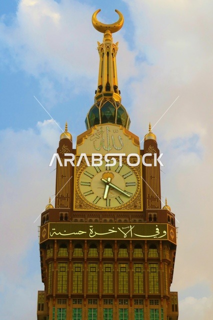 Worship and drawing closer to God, a close-up image of the Royal Clock Tower building in Mecca, the architectural engineering art of modern-style mosques, hotels and towers overlooking the Holy Mosque in the Kingdom of Saudi Arabia, sacred Islamic religious landmarks.