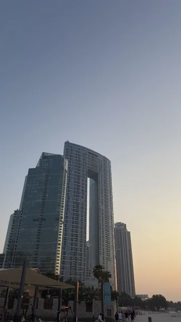 The architectural engineering art of structures, the tourist attractions of Dubai, progress, growth, and urban expansion, an image of roads and streets, towers, and skyscrapers in the United Arab Emirates.