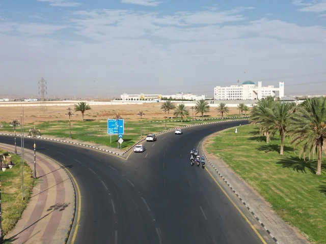 Bicycle events and races, various physical activities, traffic of cars on streets and paved roads, natural landmarks in the city of Tabuk, famous tourist attractions in the Kingdom of Saudi Arabia, maintaining health and physical fitness.