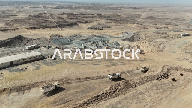 مهنة ووظيفة هندسية صناعية في السعودية، جرافات ضخمة تعمل في الحفر ورفع الأنقاض والأتربة في موقع العمل، الاعتماد على الآلات والمعدات الثقيلة في أعمال البناء،مفهوم الهندسة المعمارية والإنشاءات، تحسين البنية التحتية لإقامة المباني والمشاريع الحديثة في مدينة الرياض