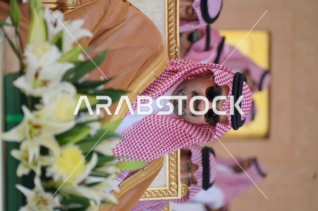 Prince Khalid bin Saud bin Abdullah bin Faisal Al Saud is wearing traditional Saudi attire and a bisht, Deputy Governor of Tabuk Region, official Saudi sessions.