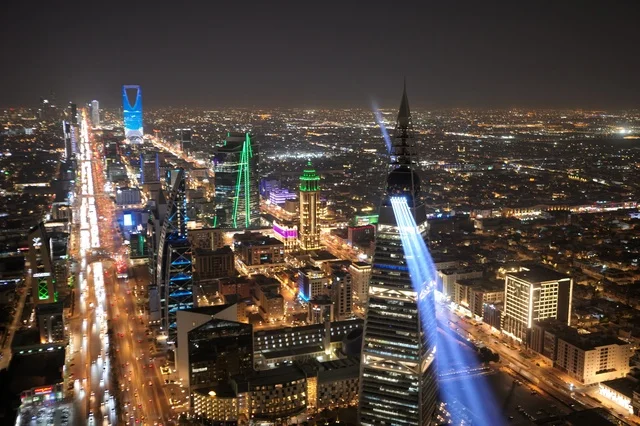 Riyadh Light Festival Season 2026, fun recreational activities, King Fahd Road in Riyadh, annual national events and celebrations, aerial drone photography of colorful light shows on the Kingdom Towers, Riyadh Light event and festival.