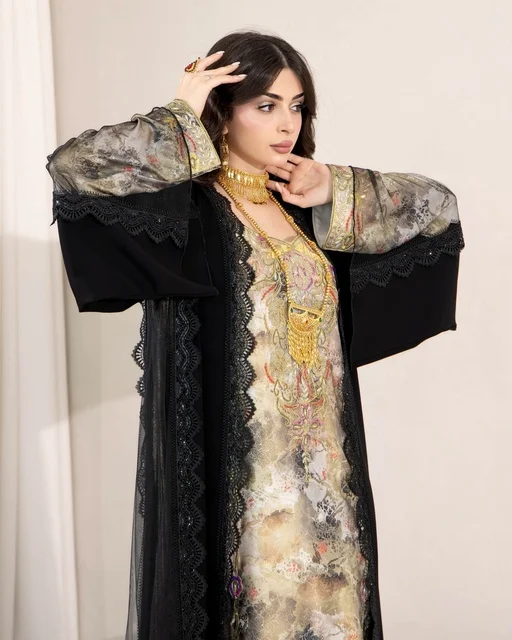 The concept of elegance, femininity, and chicness, modern contemporary fashion, attention to external appearance, a Gulf Arab Saudi woman wearing a luxurious abaya with lace and crystal details along with a shawl adorned with scattered gems, a collection of luxurious abayas.