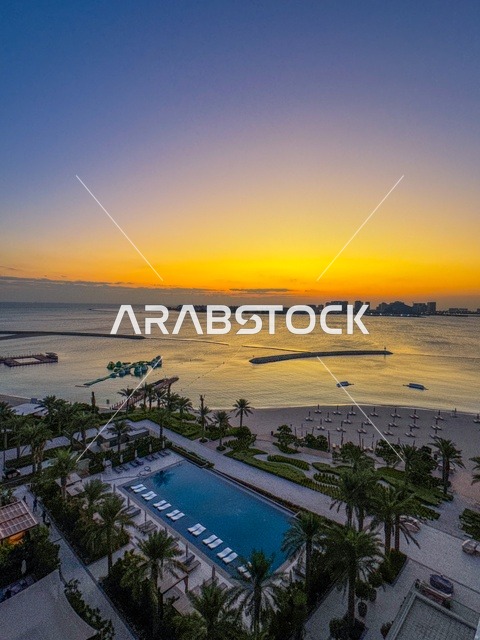 Famous tourist attractions in the United Arab Emirates, the Downtown Dubai Mall towers overlooking the sea, the Address Hotel in the Emirate of Dubai, the architectural engineering art of the towers and skyscrapers shining at night, areas that attract and draw tourists from all over the world.