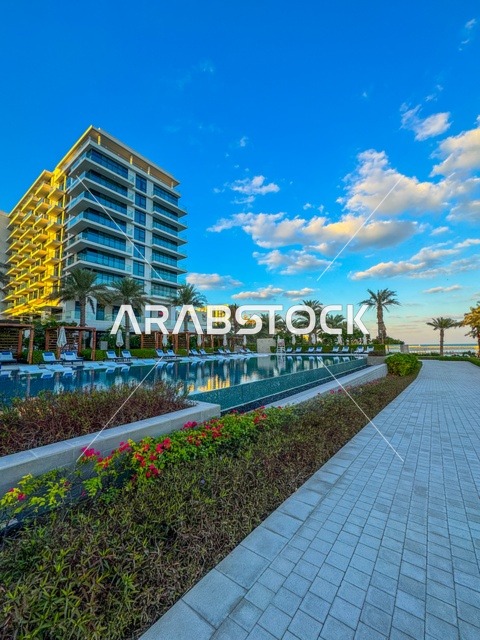 Famous tourist attractions in the United Arab Emirates, the Downtown Dubai Mall towers overlooking the sea, the Address Hotel in the Emirate of Dubai, the architectural engineering art of the towers and skyscrapers shining at night, areas that attract and draw tourists from all over the world.