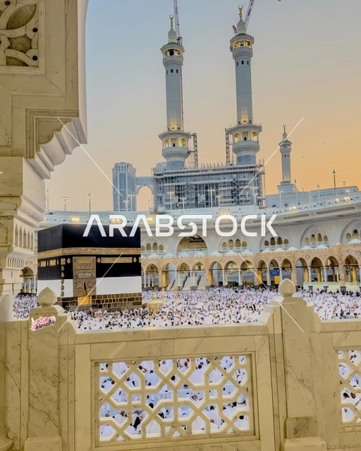 Performing the rituals of Hajj and Umrah, pilgrims in the courtyard of the Grand Mosque in Mecca, Saudi Arabia during the day, the Holy Mosque, Islamic religious landmarks, sacred cities and places, architectural art in the Islamic style.