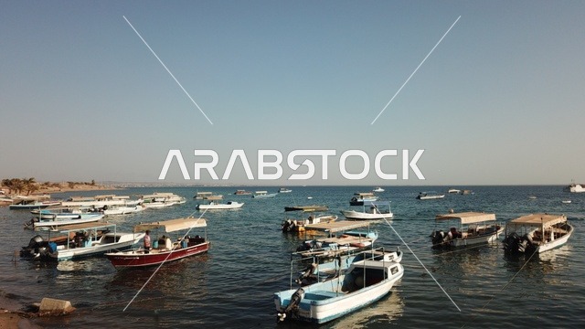 Nature and marine views, coastal areas in the Kingdom of Saudi Arabia, recreational tourist places, the waters of Sharma Beach with sand, Neom, the concept of Saudi tourism.