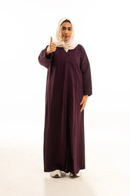 A portrait of a Saudi Arabian Gulf woman wearing a hijab and an abaya, raising her hand with gestures indicating happiness, with her thumb raised up as a sign of admiration, gestures indicating agreement and acceptance, full-body, white background.